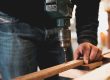 Man drilling wood