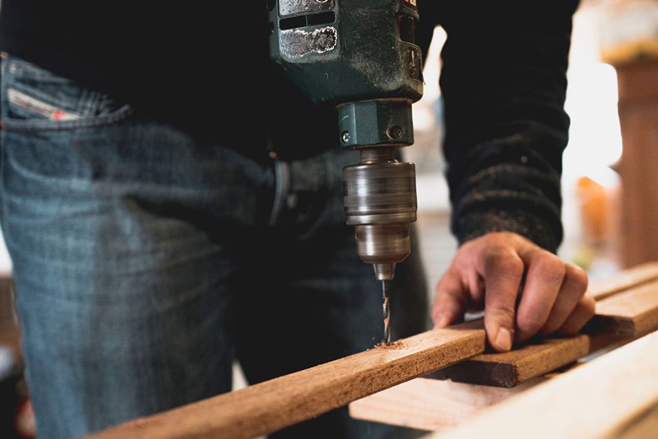 Man drilling wood